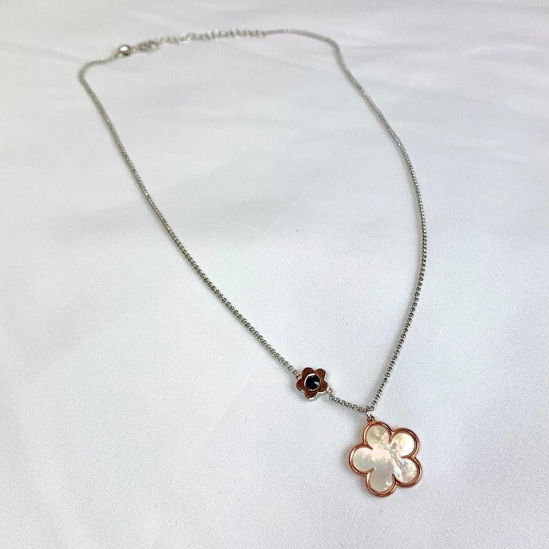 This exquisite piece features a Mother of Pearl flower at its centre, encircled by an elegant 18-carat rose gold plated border. Designed for Regency enthusiasts and Jane Austen admirers, this pendant embodies the grace and elegance of the beloved era.