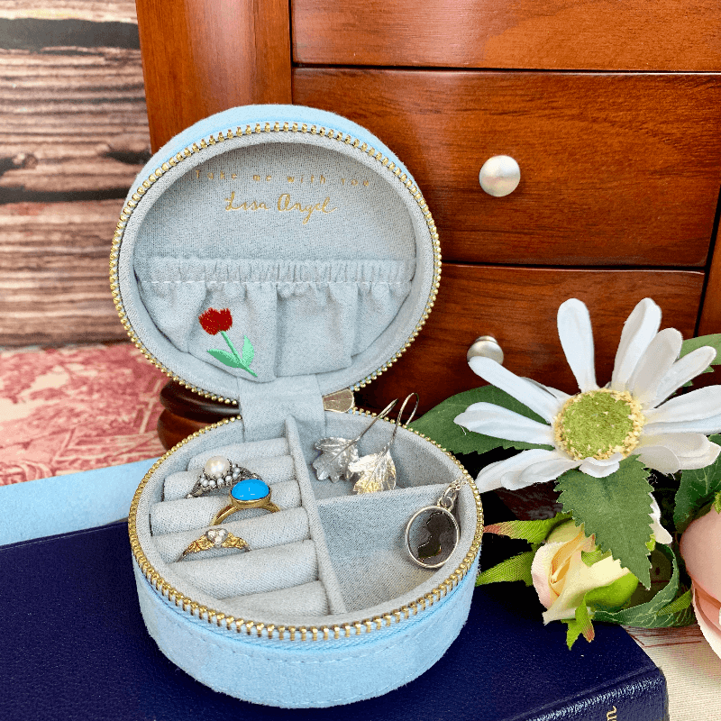 The Lady Catherine's Jewellery Box is here. It is filled with regency rings, earrings, and necklaces. The jewellery box is a pastel regency blue, 