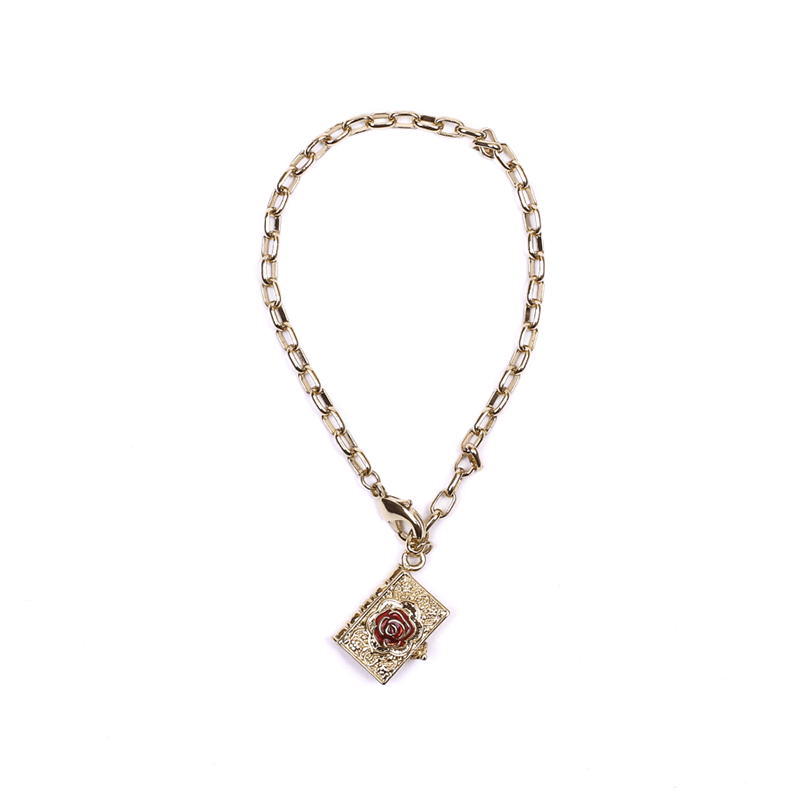 this regency inspired bracelet is made up of 18ct gold-plated links attached to a small book pendant. The pendant has a rose designed on the front and a inscription on the inside. It makes a beautiful jane austen gift or pride and prejudice gift. The bracelet is perfectly regency inspired, meaning it pair's well with any regency style or historical outfit